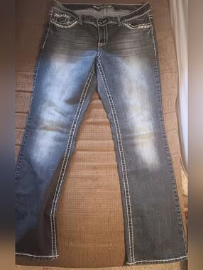 Maurices Dark Blue Bootcut Jeans with White Topstitching